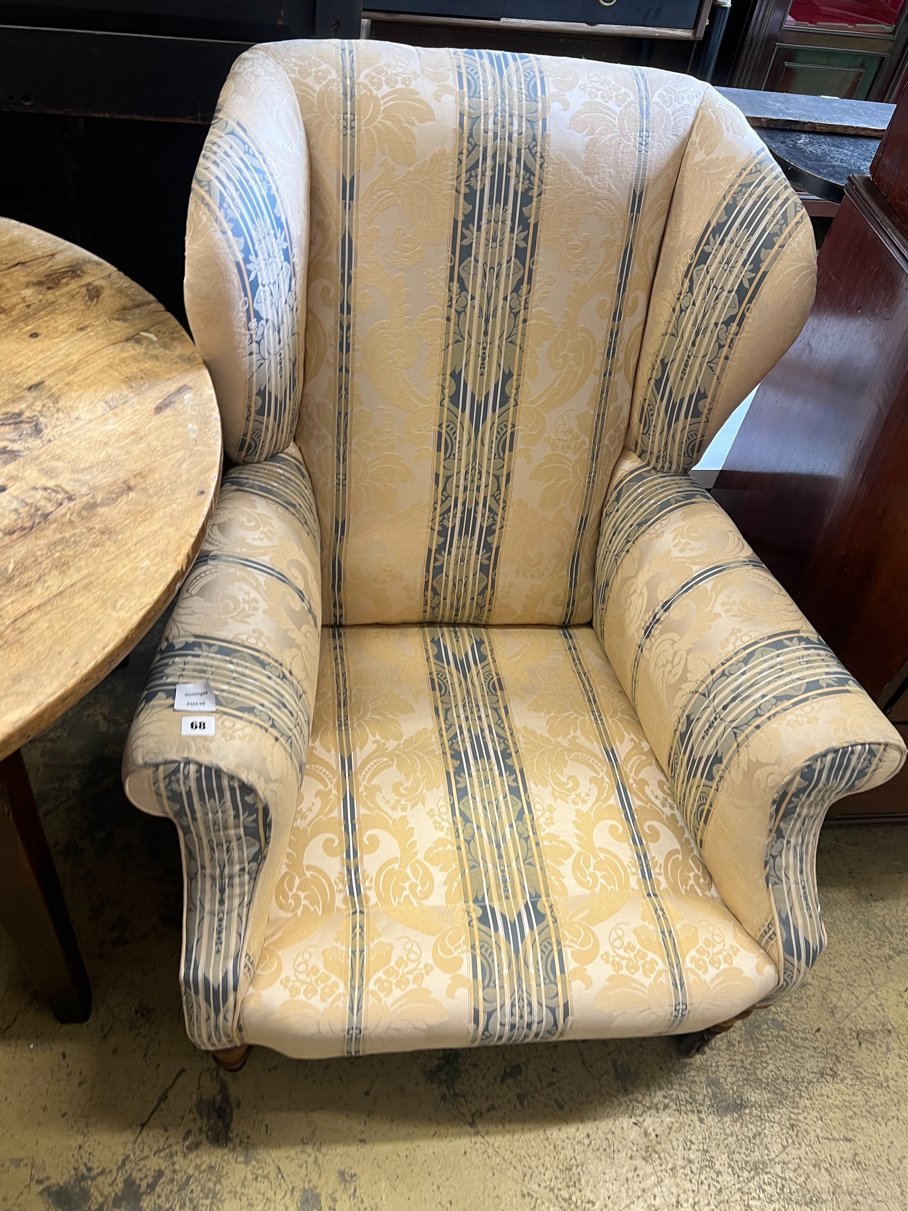 A late Victorian oak armchair